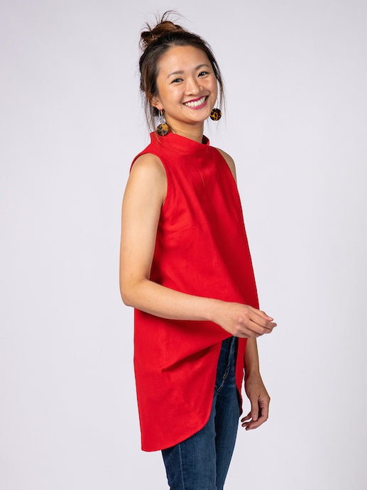 Swahlee creates a handmade capsule wardrobe of clothing essentials made in India using sustainable production and natural fabrics. The Stand Collar Tunic in Red.