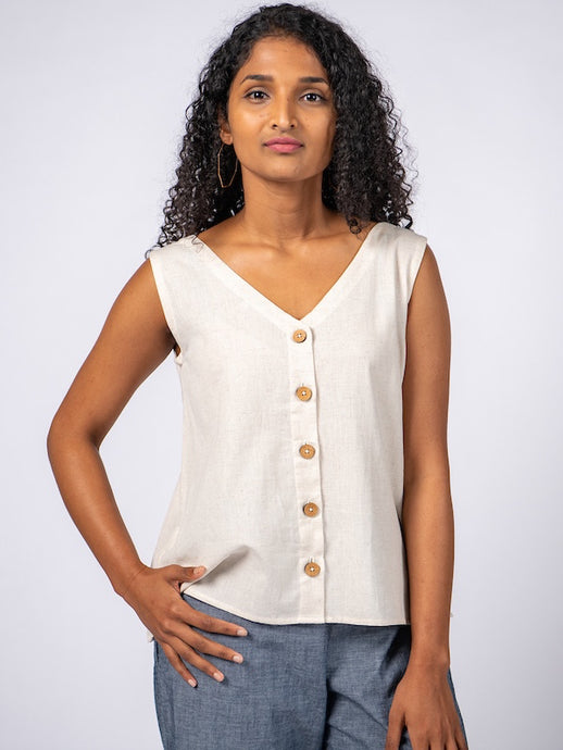 Swahlee creates a handmade capsule wardrobe of clothing essentials made in India using sustainable production and natural fabrics. The Sleeveless Reversible Top in Natural Cotton Linen.. 