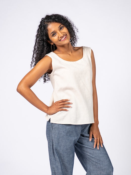 Swahlee creates a handmade capsule wardrobe of clothing essentials made in India using sustainable production and natural fabrics. The Sleeveless Reversible Top in Natural Cotton Linen.