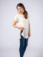Swahlee creates a handmade capsule wardrobe of clothing essentials made in India using sustainable production and natural fabrics. The Kaftan Tunic in Sheer Striped Natural. 