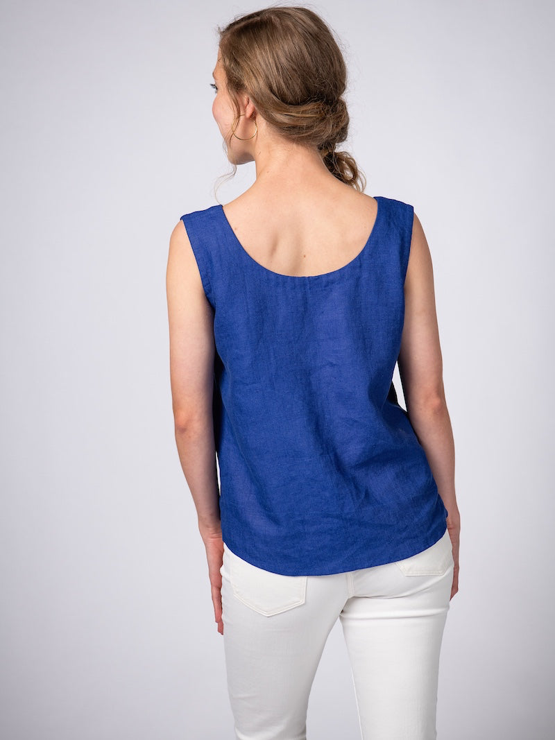 Swahlee creates a handmade capsule wardrobe of clothing essentials made in India using sustainable production and natural fabrics. The Sleeveless Reversible Top in Royal Blue Linen.