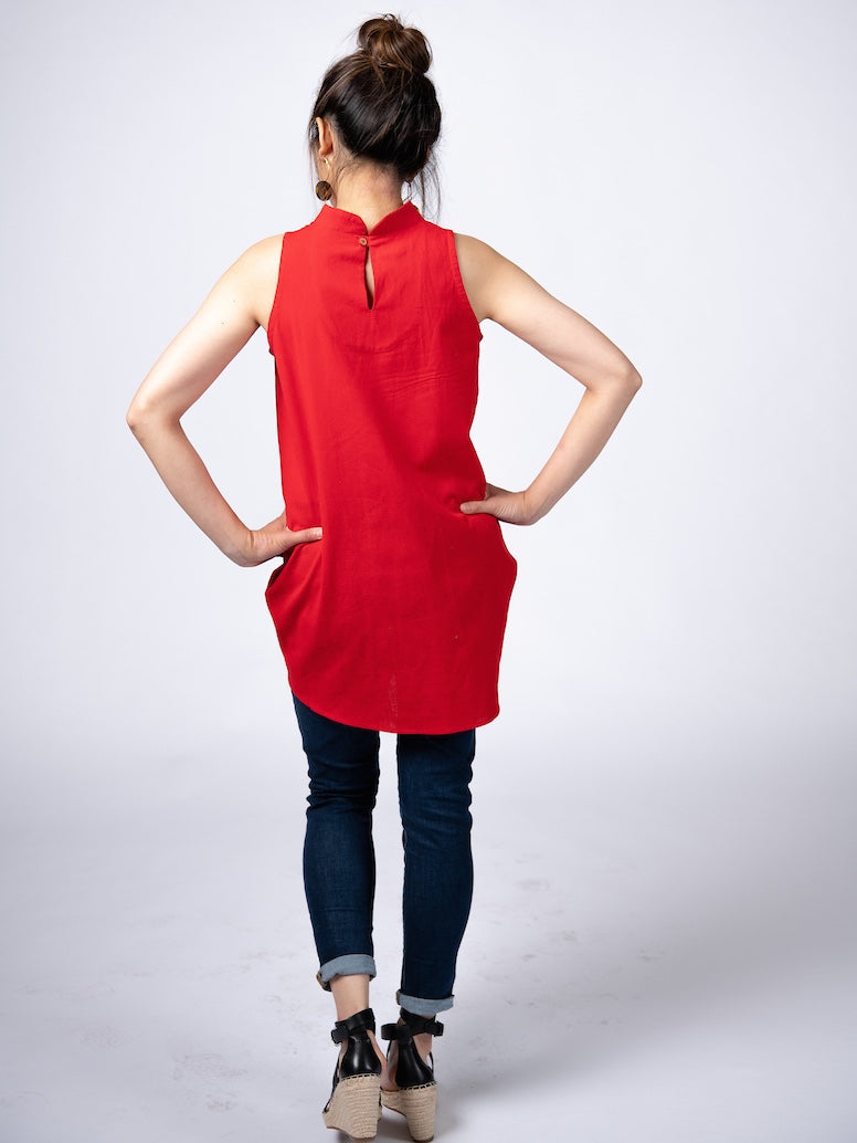Swahlee creates a handmade capsule wardrobe of clothing essentials made in India using sustainable production and natural fabrics. The Stand Collar Tunic in Red.