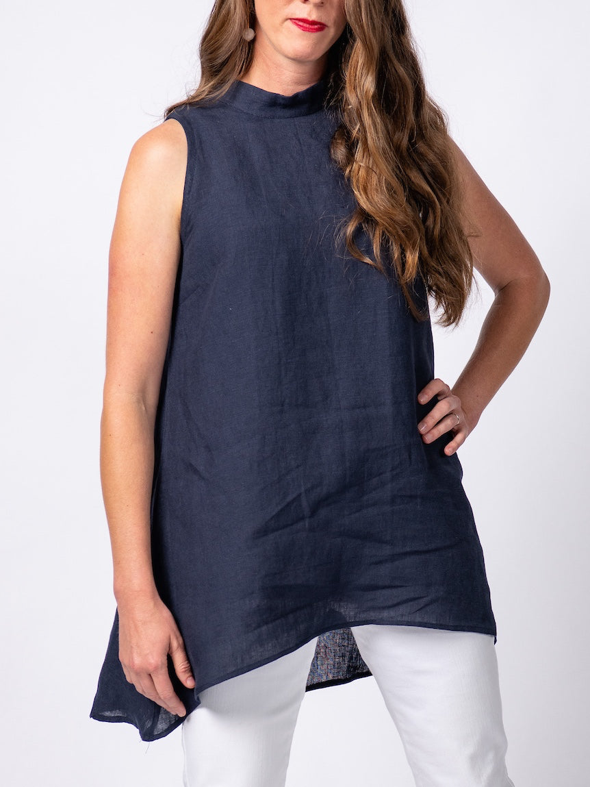 Swahlee creates a handmade capsule wardrobe of clothing essentials made in India using sustainable production and natural fabrics. The Stand Collar Tunic in Navy. 