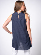 Swahlee creates a handmade capsule wardrobe of clothing essentials made in India using sustainable production and natural fabrics. The Stand Collar Tunic in Navy.