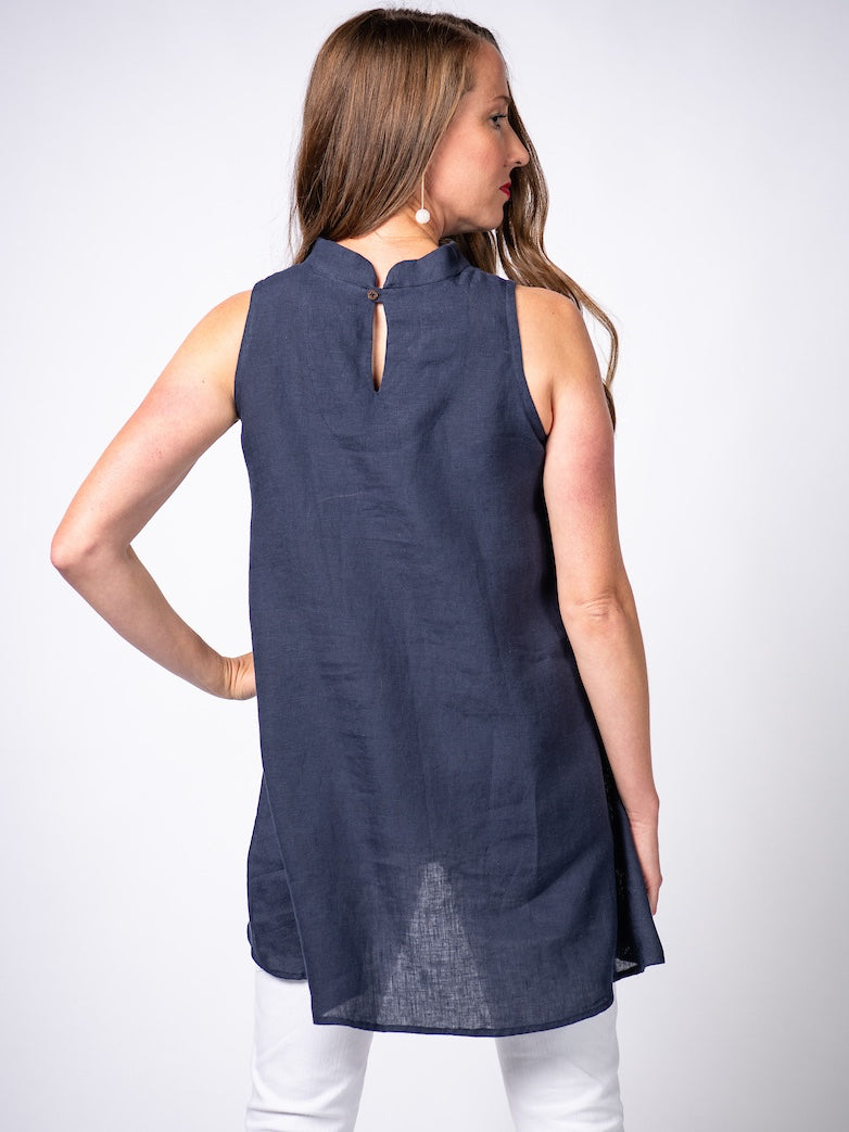 Swahlee creates a handmade capsule wardrobe of clothing essentials made in India using sustainable production and natural fabrics. The Stand Collar Tunic in Navy.
