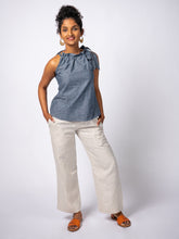 Load image into Gallery viewer, Swahlee creates a handmade capsule wardrobe of clothing essentials made in India using sustainable production and natural fabrics. The Tie-Neck Halter Top in Chambray. 
