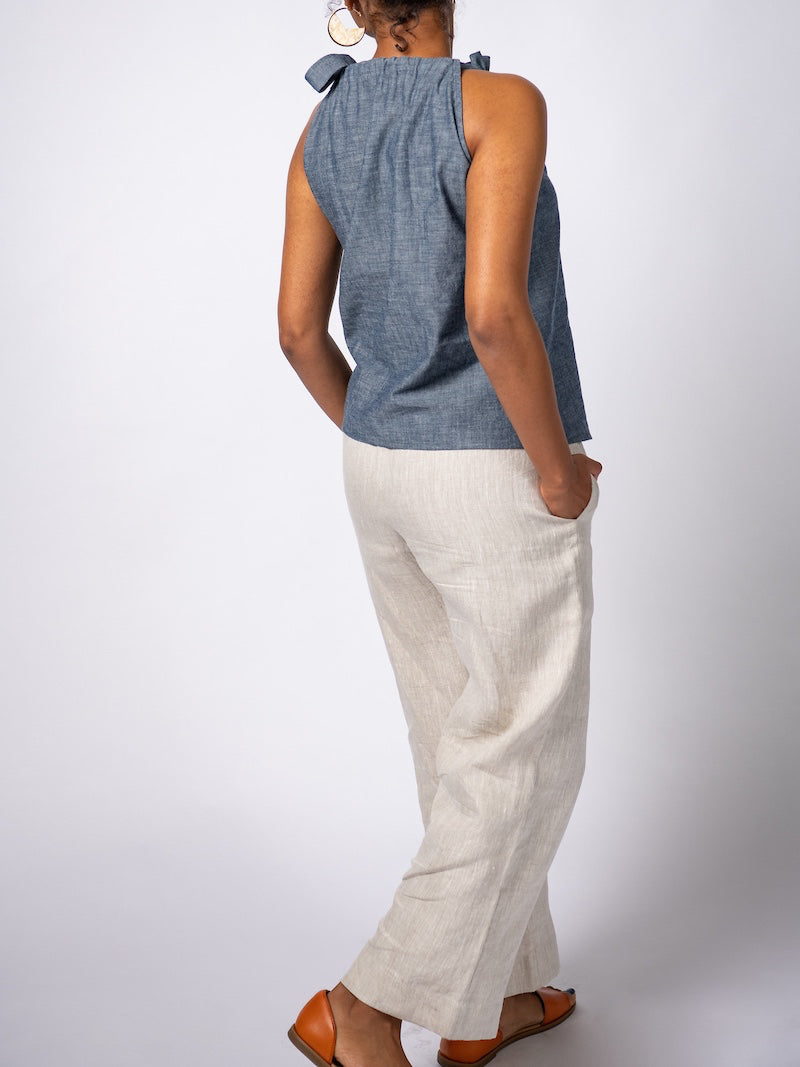Swahlee creates a handmade capsule wardrobe of clothing essentials made in India using sustainable production and natural fabrics. The Wide Leg Trousers in Natural Linen. 