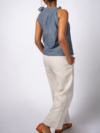 Swahlee creates a handmade capsule wardrobe of clothing essentials made in India using sustainable production and natural fabrics. The Wide Leg Trousers in Natural Linen. 
