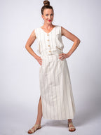 Swahlee creates a handmade capsule wardrobe of clothing essentials made in India using sustainable production and natural fabrics. The Wrap Maxi Skirt in Natural with Sage Stripes.