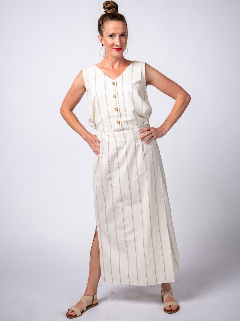 Swahlee creates a handmade capsule wardrobe of clothing essentials made in India using sustainable production and natural fabrics. The Wrap Maxi Skirt in Natural with Sage Stripes.