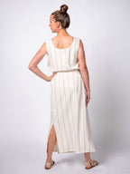 Swahlee creates a handmade capsule wardrobe of clothing essentials made in India using sustainable production and natural fabrics. The Wrap Maxi Skirt in Natural with Sage Stripes.