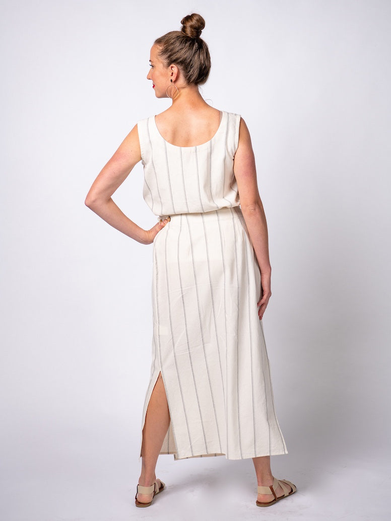 Swahlee creates a handmade capsule wardrobe of clothing essentials made in India using sustainable production and natural fabrics. The Wrap Maxi Skirt in Natural with Sage Stripes.