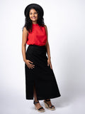 Swahlee creates a handmade capsule wardrobe of clothing essentials made in India using sustainable production and natural fabrics. The Wrap Maxi Skirt in Black.