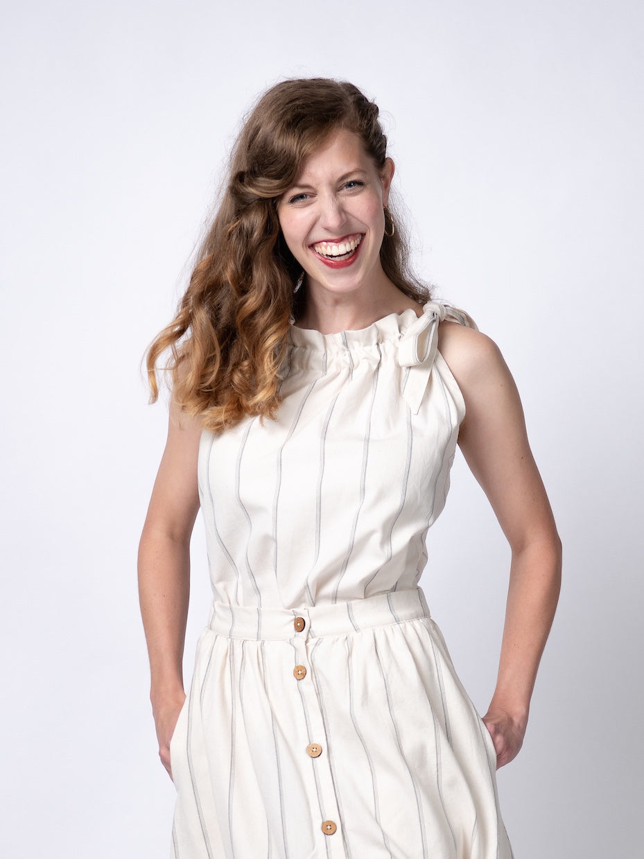 Swahlee creates a handmade capsule wardrobe of clothing essentials made in India using sustainable production and natural fabrics. The Tie-Neck Halter Top in Natural with Sage Stripes.