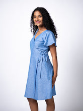 Load image into Gallery viewer, Swahlee creates a handmade capsule wardrobe of clothing essentials made in India using sustainable production and natural fabrics. The Wrap Dress in True Blue.
