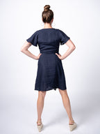 Swahlee creates a handmade capsule wardrobe of clothing essentials made in India using sustainable production and natural fabrics. The Wrap Dress in Navy.