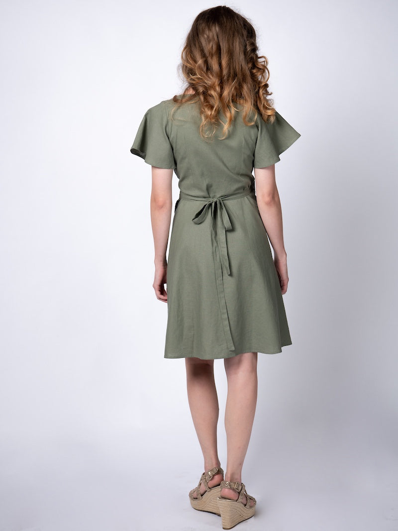 Swahlee creates a handmade capsule wardrobe of clothing essentials made in India using sustainable production and natural fabrics. The Wrap Dress in Sage Green. 