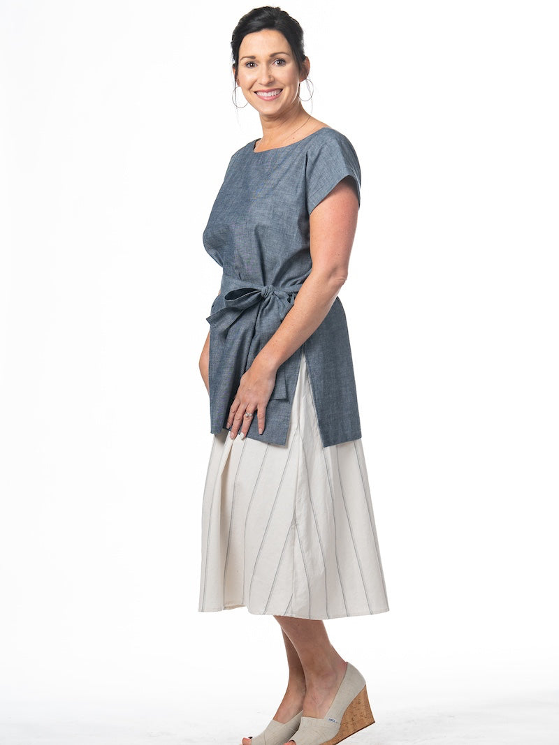 Swahlee creates a handmade capsule wardrobe of clothing essentials made in India using sustainable production and natural fabrics. The Kaftan Tunic in Chambray.