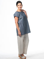 Swahlee creates a handmade capsule wardrobe of clothing essentials made in India using sustainable production and natural fabrics. The Kaftan Tunic in Chambray. 