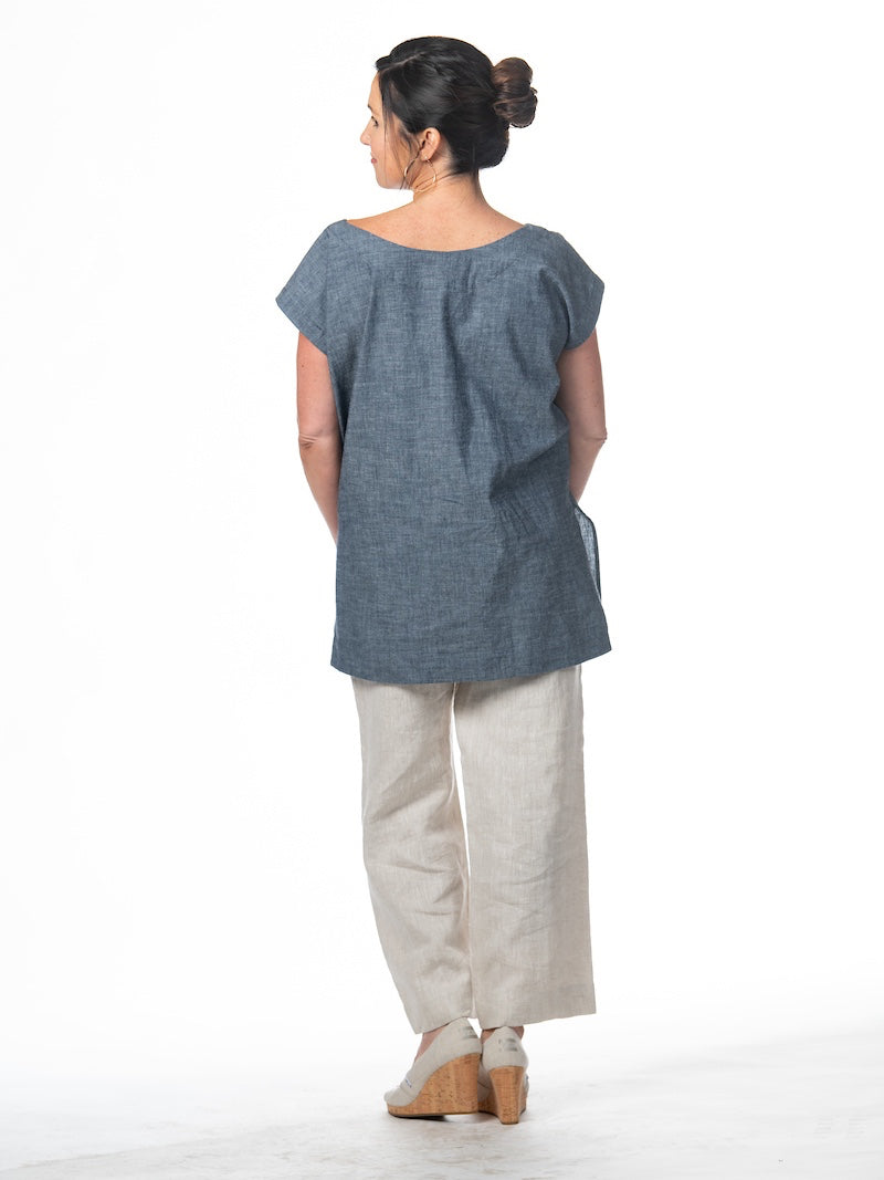 Swahlee creates a handmade capsule wardrobe of clothing essentials made in India using sustainable production and natural fabrics. The Kaftan Tunic in Chambray. 