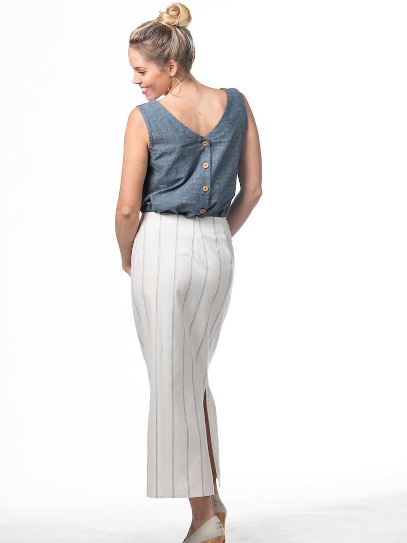 Swahlee creates a handmade capsule wardrobe of clothing essentials made in India using sustainable production and natural fabrics. The Wrap Maxi Skirt in Natural with Sage Stripes.