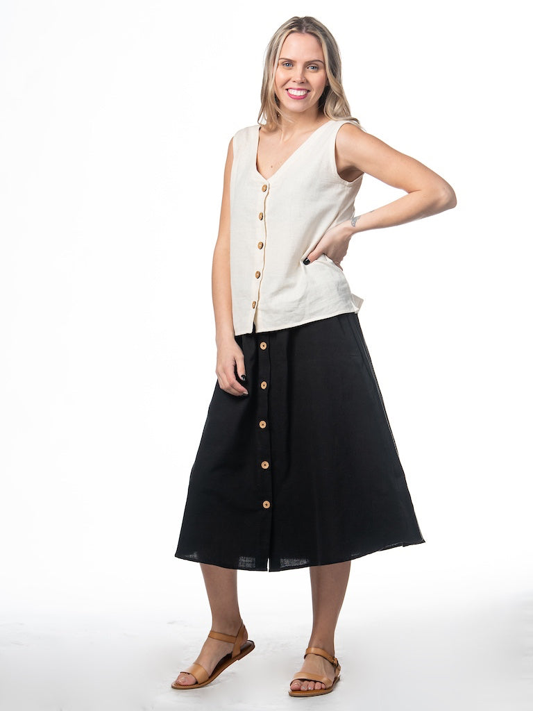 Swahlee creates a handmade capsule wardrobe of clothing essentials made in India using sustainable production and natural fabrics. The Sleeveless Reversible Top in Natural Cotton Linen. 
