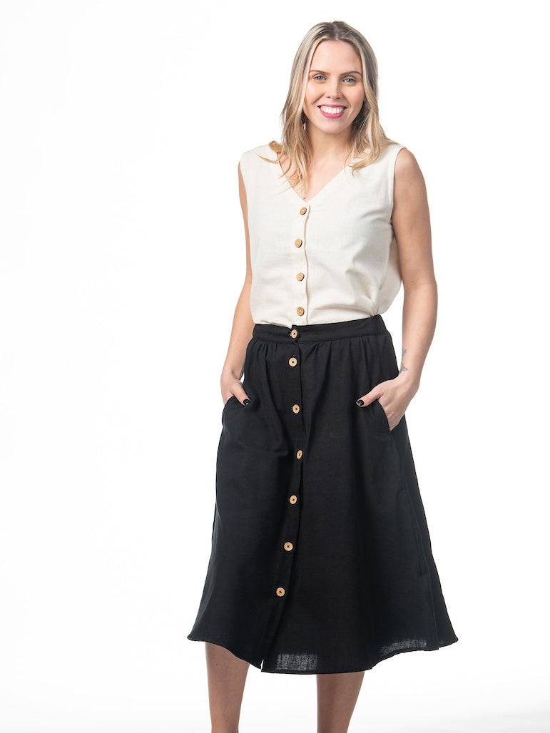 Swahlee creates a handmade capsule wardrobe of clothing essentials made in India using sustainable production and natural fabrics. The Sleeveless Reversible Top in Natural Cotton Linen. 