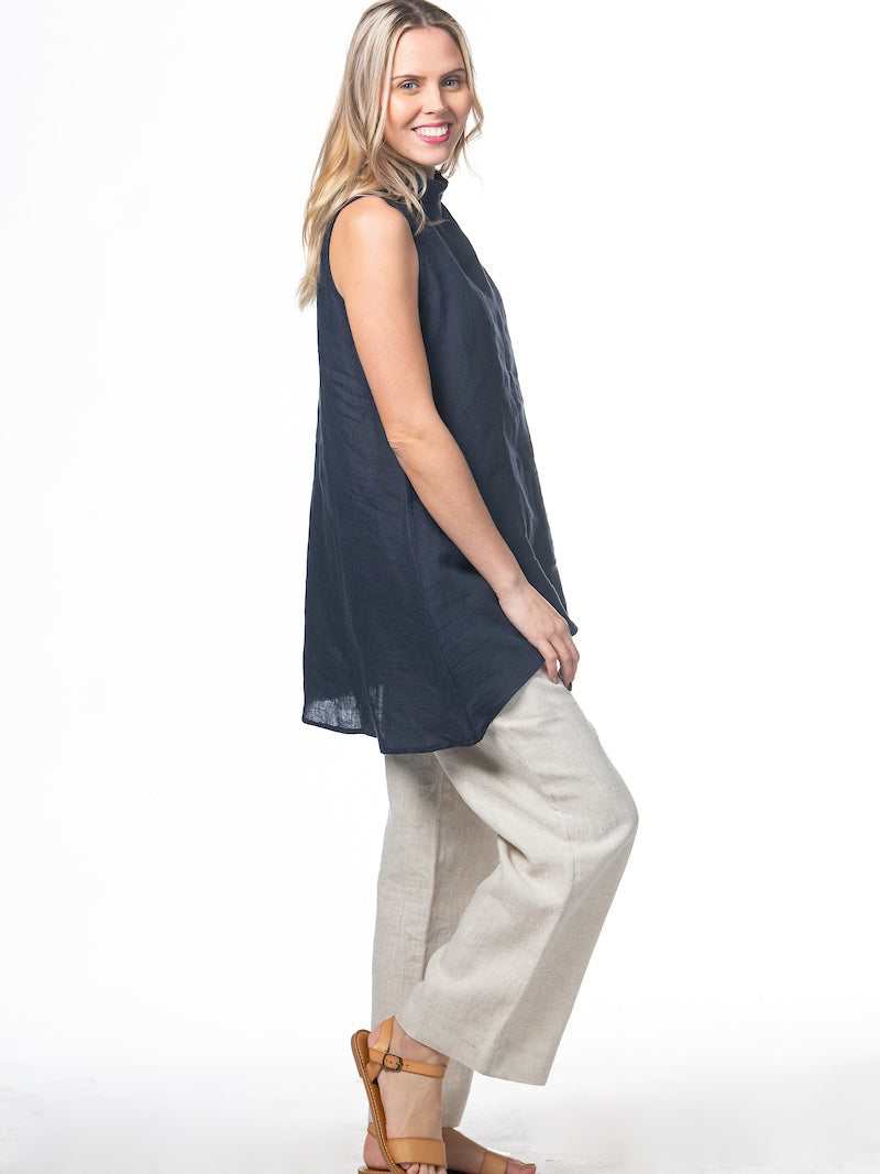 Swahlee creates a handmade capsule wardrobe of clothing essentials made in India using sustainable production and natural fabrics. The Stand Collar Tunic in Navy.