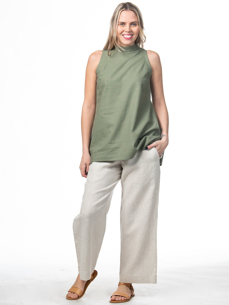 Swahlee creates a handmade capsule wardrobe of clothing essentials made in India using sustainable production and natural fabrics. The Stand Collar Tunic in Sage Green.
